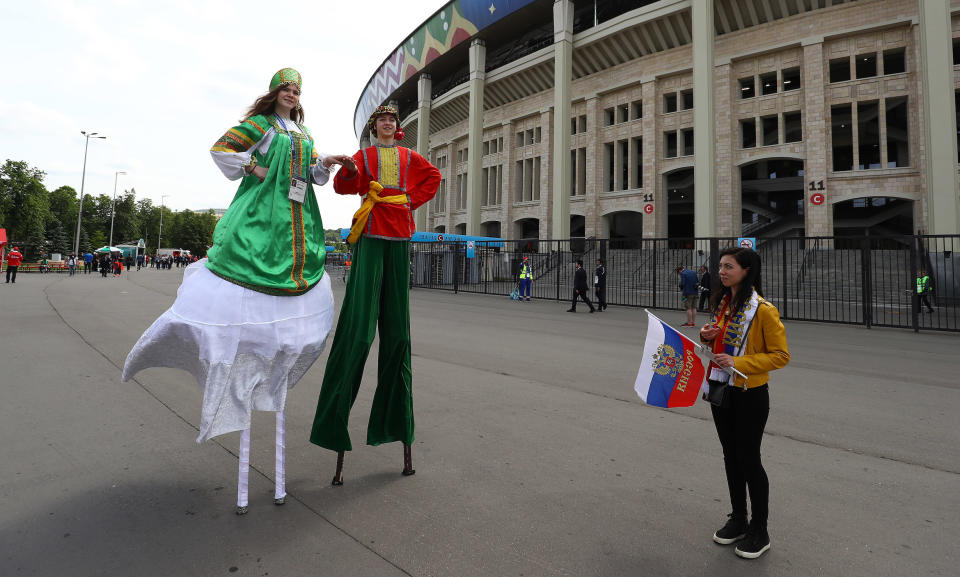 <p>Entertainers on stilts outside the stadium ahead of kick off<br> Russia v Saudi Arabia (Rex) </p>