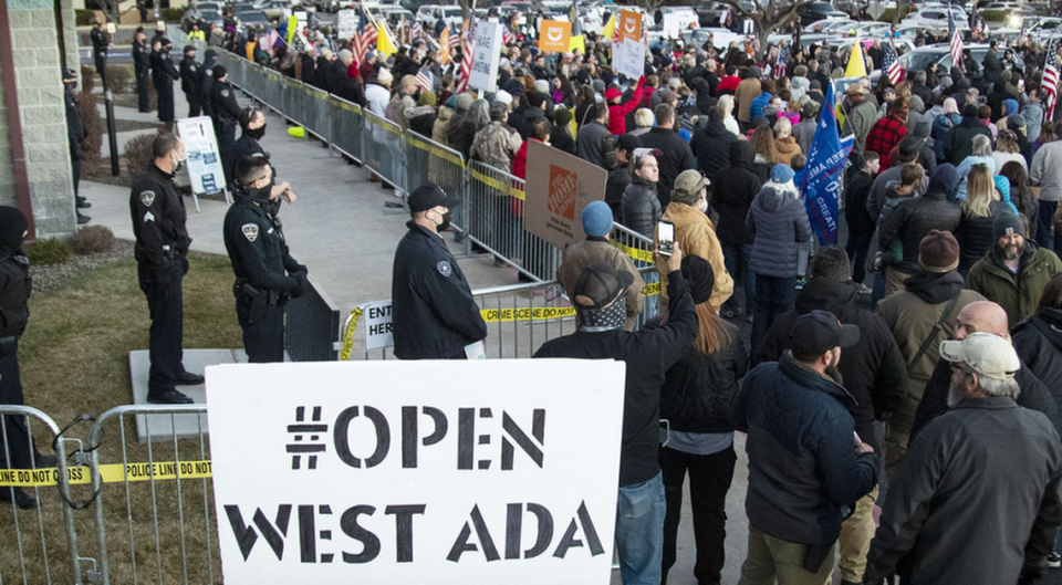 At an anti-mask protest outside Central District Health last December, one person made their feelings known about schools in the West Ada district.