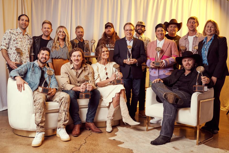 A crowd of honorees gathers around at the 13th CMA Triple Play Awards, held March 1 at Saint Elle in Nashville. The event celebrated songwriters who penned three No. 1 songs within a 12-month period. They included Kurt Allison, Luke Combs, Jesse Frasure, Nicolle Galyon, Ashley Gorley, Charlie Handsome, HARDY, Ben Johnson, Tully Kennedy, Shane McAnally, Chase McGill, Thomas Rhett, ERNEST, Josh Thompson and Morgan Wallen.