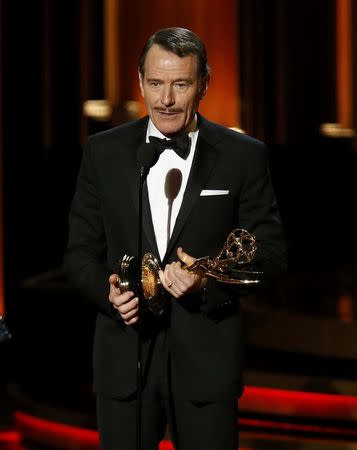 Bryan Cranston accepts the award for Outstanding Lead Actor In A Drama Series for his role in "Breaking Bad" during the 66th Primetime Emmy Awards in Los Angeles, California August 25, 2014. REUTERS/Mario Anzuoni