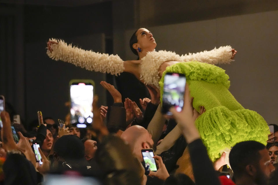 A model wears a creation as part of the Sunnei women's Fall-Winter 2023-24 collection presented in Milan, Italy, Friday, Feb. 24, 2023. (AP Photo/Luca Bruno)