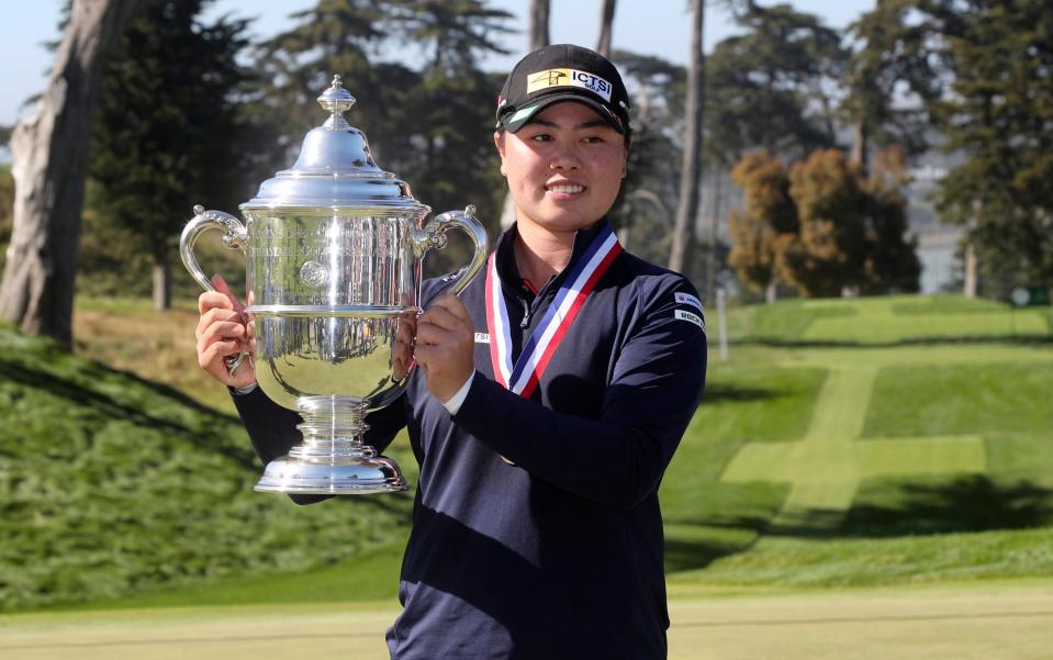 Yuka Saso with the US Open trophy in 2021