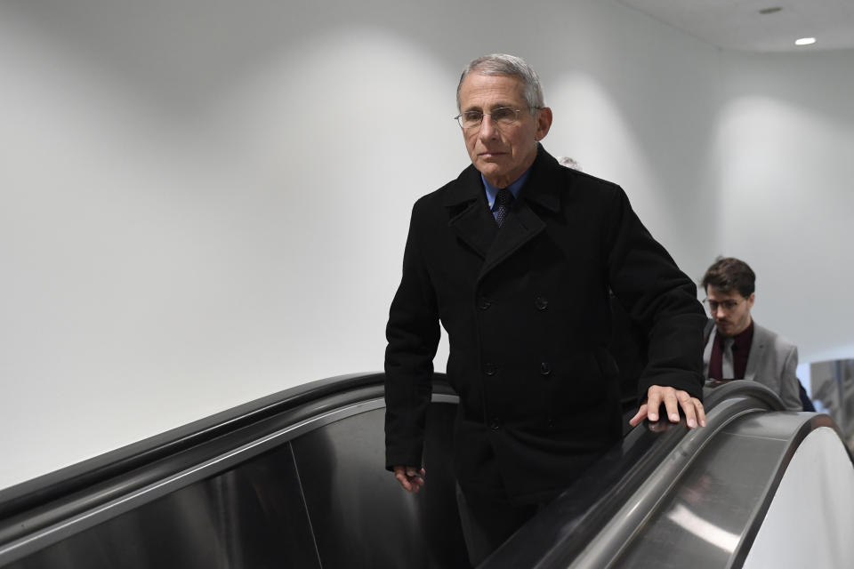 National Institute for Allergy and Infectious Diseases Director Dr. Anthony Fauci walks on Capitol Hill in Washington, Thursday, March 12, 2020, in between briefings on the coronavirus. (AP Photo/Susan Walsh)
