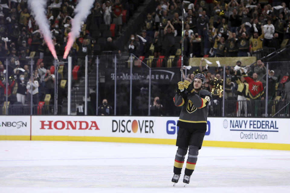 Vegas Golden Knights center Mattias Janmark thanks fans after the Golden Knights defeated the Minnesota Wild in Game 7 of an NHL hockey Stanley Cup first-round playoff series Friday, May 28, 2021, in Las Vegas. Janmark scored a hat trick. (AP Photo/Joe Buglewicz)