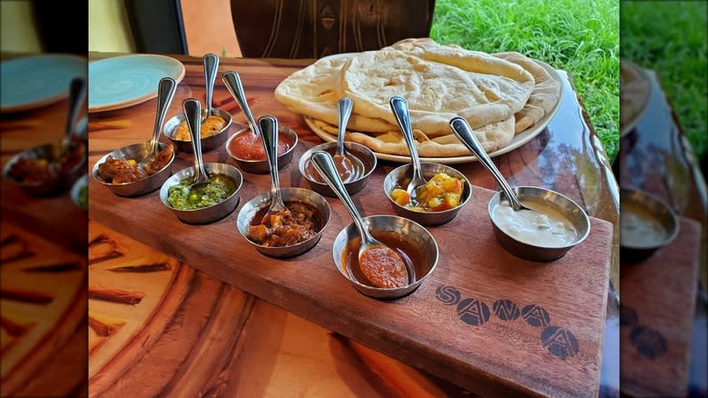 bread and bowls of dips