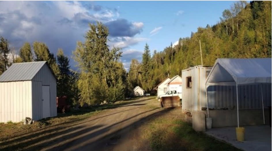 <i>Kenville Mine: Photos of site showing office buildings, parking and workshop.</i>