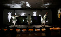 Japanese telecommunications company NTT's "Kirari! for Arena", which uses multiple cameras to track the movements of the player and images are transported to devices which show 3D hologram figures in real-time at a different location, displays visual dancers among real ones during the company's exhibition in Tokyo, Japan, February 22, 2018. REUTERS/Toru Hanai