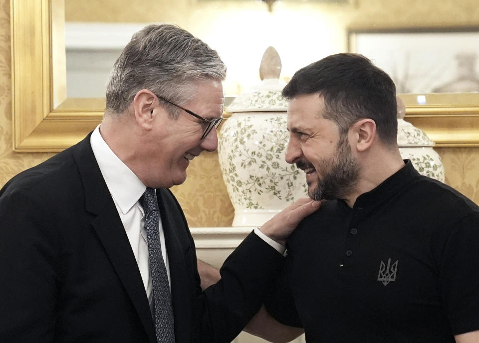 Britain's Prime Minister Keir Starmer, left, greets Ukraine's President Volodymyr Zelenskyy during a bilateral meeting at a hotel in Washington, ahead of the Nato summit, Wednesday July 10, 2024. (Stefan Rousseau/Pool Photo via AP)