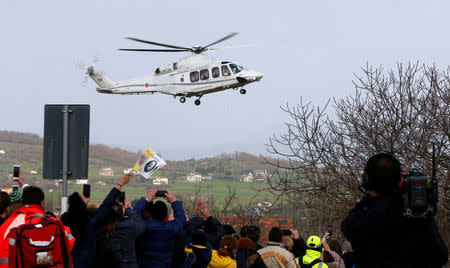 Pope Francis arrives by helicopter in Pietrelcina, Italy March 17 2018. REUTERS/Ciro De Luca