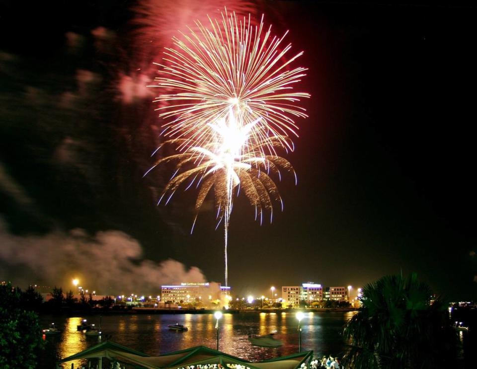 Fireworks light the sky over Bayfront Park on New Year’s Eve.