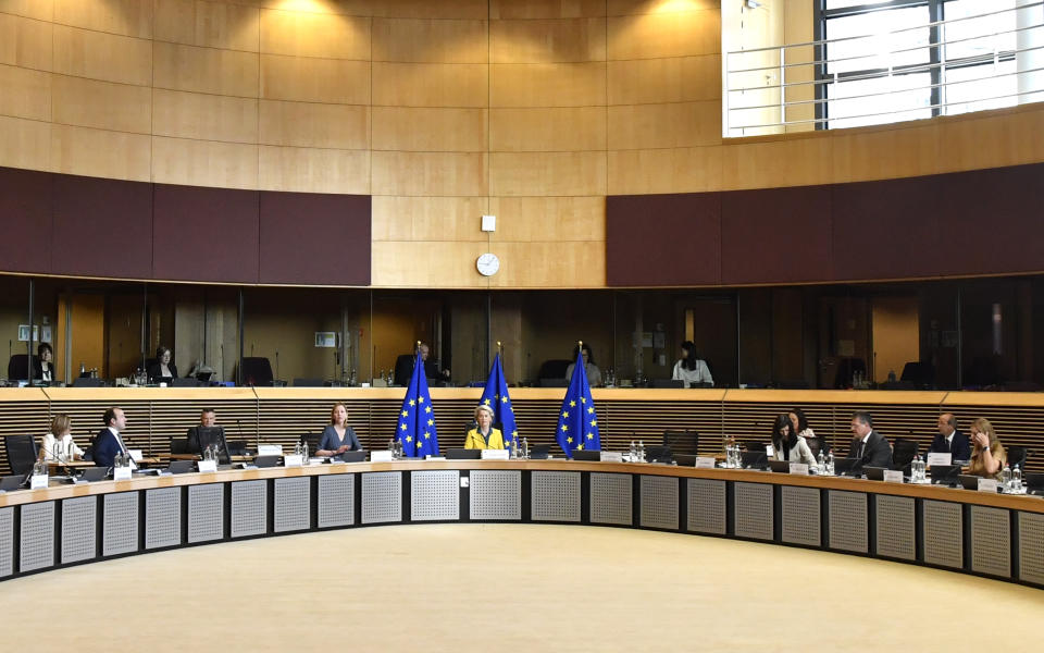 European Commission President Ursula von der Leyen, center, chairs a meeting of the College of Commissioners at EU headquarters in Brussels, Friday, June 17, 2022. Ukraine's request to join the European Union may advance Friday with a recommendation from the EU's executive arm that the war-torn country deserves to become a candidate for membership in the 27-nation bloc. (AP Photo/Geert Vanden Wijngaert)