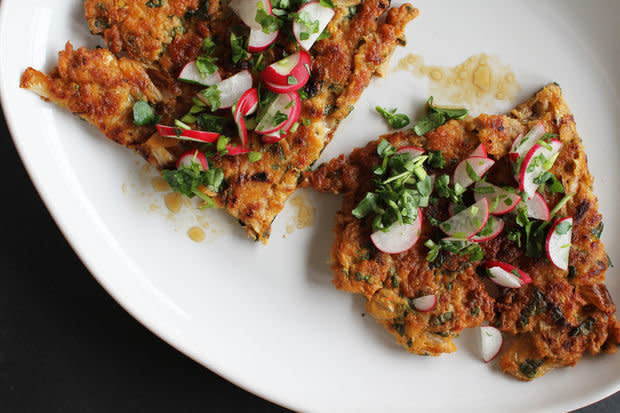 <strong>Get the <a href="http://food52.com/recipes/21696-kimchi-pork-scallion-pancake-with-watercress-radish-relish" target="_blank">Scallion Pancake with Watercress-Radish Relish recipe</a>&nbsp;from CarolineWright via Food52</strong>