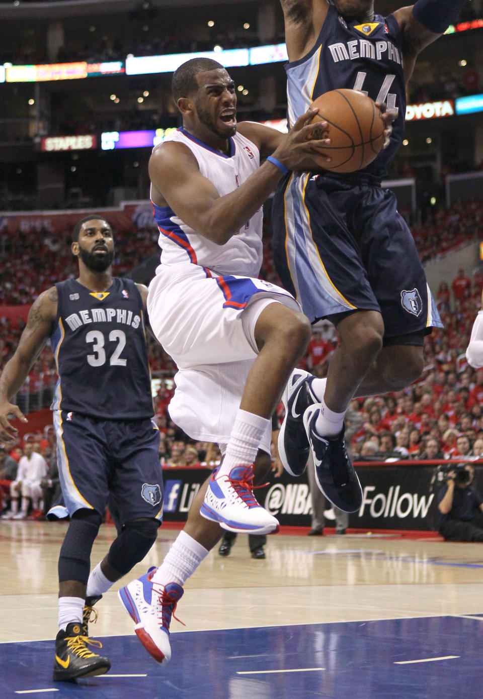 LOS ANGELES, CA - MAY 05: Chris paul #3 of the Los Angeles Clippers goes up with the ball against the Memphis Grizzlies in Game Three of the Western Conference Quarterfinals in the 2012 NBA Playoffs on May 5, 2011 at Staples Center in Los Angeles, California. The Clippers won 87-86 to take a two games to one lead in the series. NOTE TO USER: User expressly acknowledges and agrees that, by downloading and or using this photograph, User is consenting to the terms and conditions of the Getty Images License Agreement. (Photo by Stephen Dunn/Getty Images)