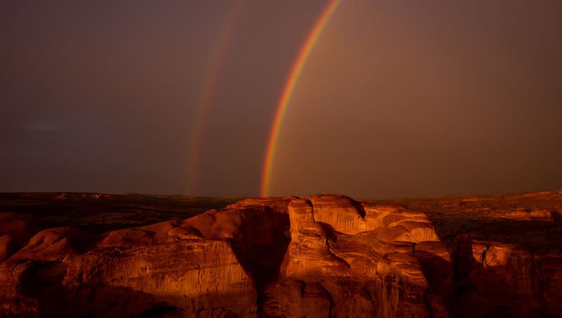 A double rainbow is pictured in the sky at Arches National Park near Moab on Saturday, Sept. 18, 2021.