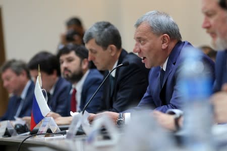 Russian Deputy Prime Minister Yury Borisov speaks during a meeting in Caracas