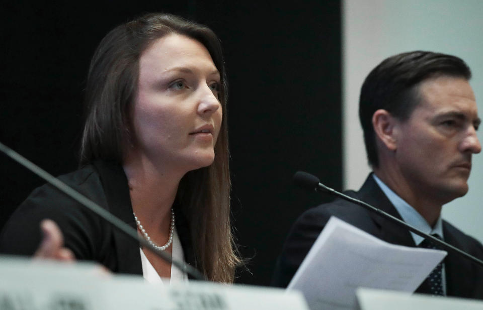 Courtney Wild, left, joined by her attorney Brad Edwards, reads a statement during a news conference, calling on victims of Jeffrey Epstein to contact the FBI or lawyers with their information, Tuesday July 16, 2019, in New York. (AP Photo/Bebeto Matthews)