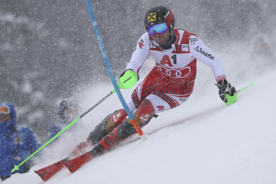 Austria's Marcel Hirscher competes during an alpine ski, men's World Cup slalom, in Kitzbuehel, Austria, Saturday Jan. 26, 2019. (AP Photo/Alessandro Trovati)