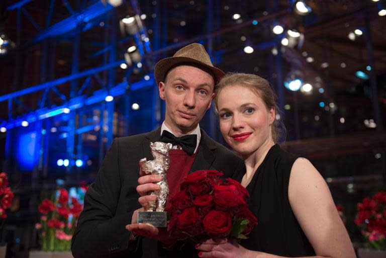 Dietrich and Anna Brueggemann pictured with their Silver Bear trophy for Best Script at the Berlin film festival on February 15, 2014