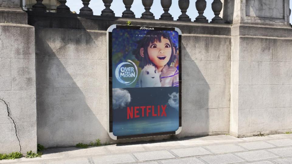 A Netflix poster on a wall.