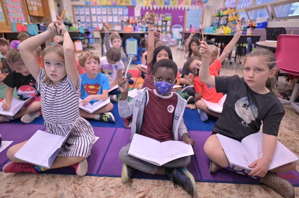 When students are in school consistently, they learn more, do better and are more likely to graduate from high school. <a href="https://www.gettyimages.com/detail/news-photo/from-front-left-harper-smith-salif-wane-london-hicks-and-news-photo/1243599140" rel="nofollow noopener" target="_blank" data-ylk="slk:Hyoung Chang/The Denver Post;elm:context_link;itc:0;sec:content-canvas" class="link ">Hyoung Chang/The Denver Post</a>