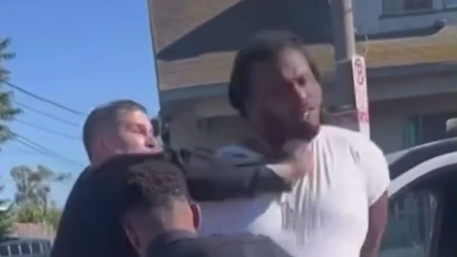 Los Angeles police officer punches man in the face