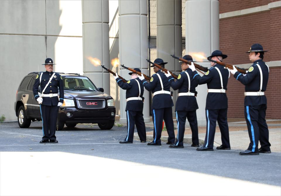 A volley was fired then Taps was performed by the CPD Honor Guard during Friday's memorial honoring fallen officers in Clarksville.