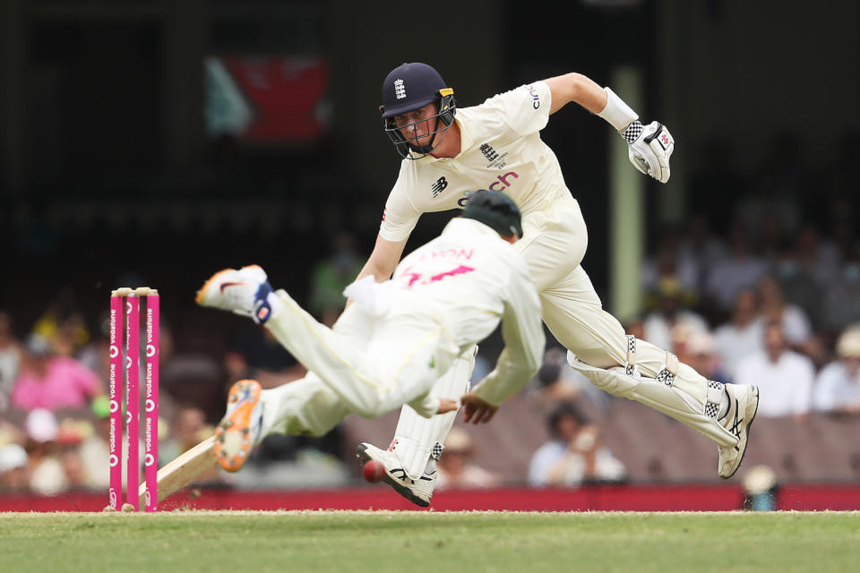 Zak Crawley of England stretches to make his crease during day five of the Fourth Test Match in the Ashes series between Australia and England in 2022. Photo by Mark Metcalfe – CA/Cricket Australia via Getty Images