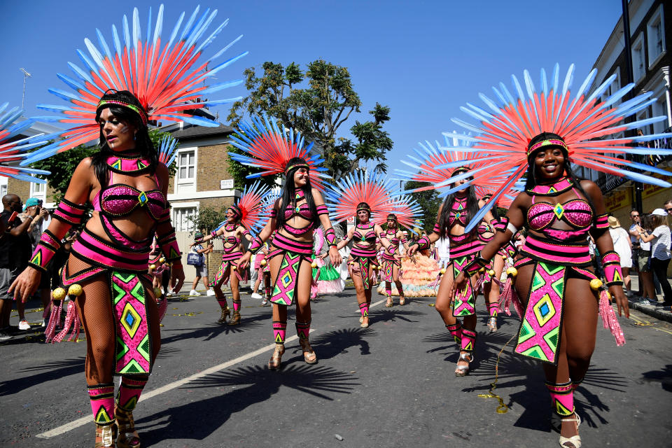 Revellers take part in the Notting Hill Carnival in London, Britain August 26, 2019. (Photo: Toby Melville/Reuters)