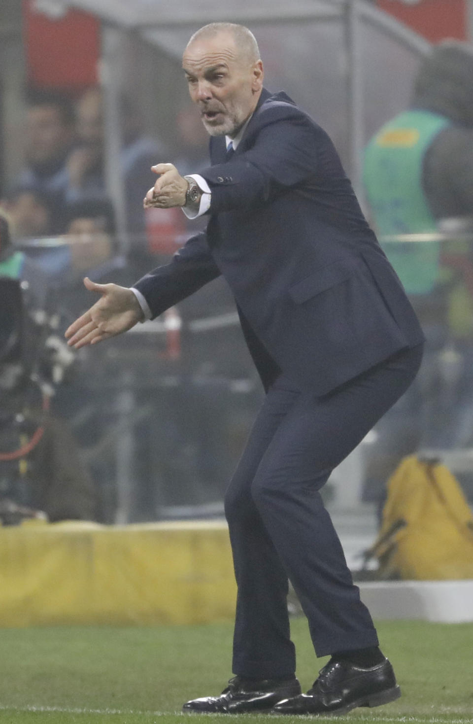 Inter Milan coach Stefano Pioli gestures during an Italian Cup quarterfinal soccer match between Inter Milan and Lazio, at the San Siro stadium in Milan, Italy, Tuesday, Jan. 31, 2017. (AP Photo/Luca Bruno)