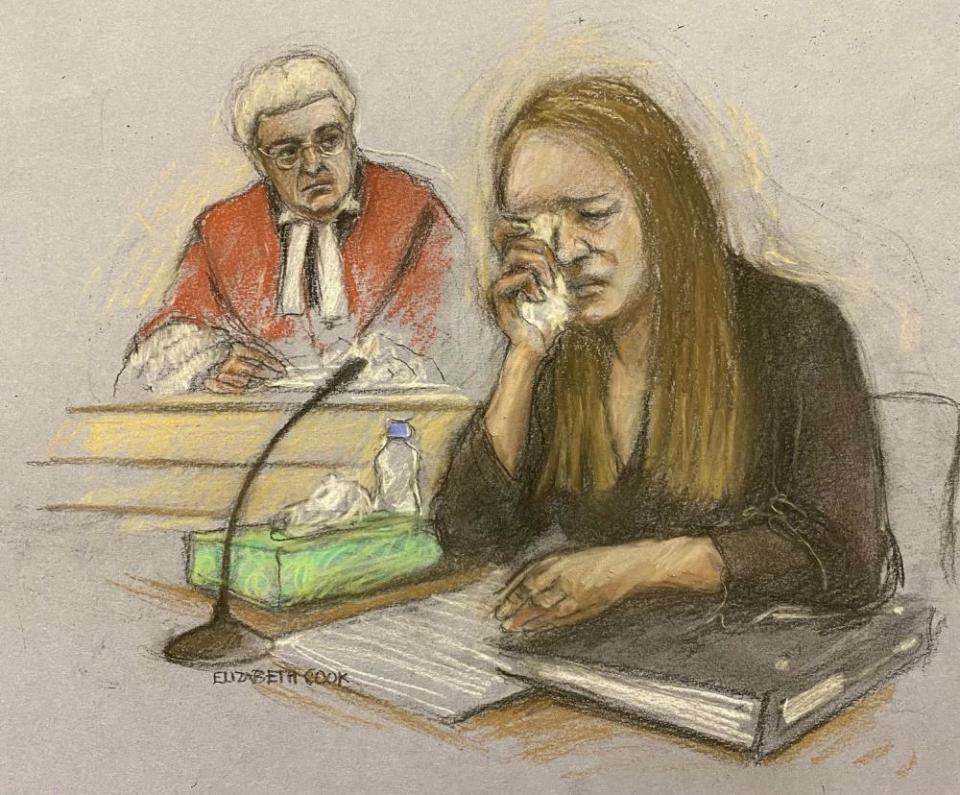 Court artist’s sketch of Lucy Letby crying in the dock at Manchester crown court.