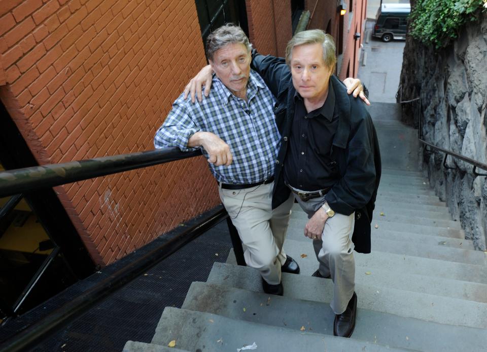 Author William Peter Blatty (left) and director William Friedkin pose on the "Exorcist" steps, the outdoor staircase in Washington's Georgetown enclave made famous by the movie.