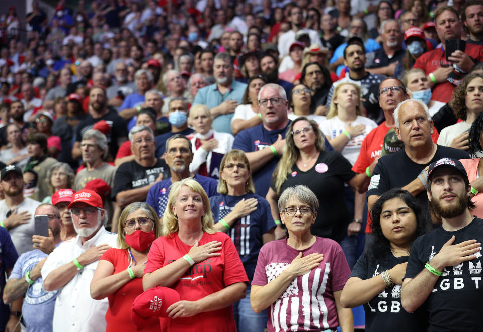 TULSA, OKLAHOMA - JUNE 20: Supporters participate in the Pledge of Allegiance during a campaign rally for U.S. President Donald Trump at the BOK Center, June 20, 2020 in Tulsa, Oklahoma. Trump is holding his first political rally since the start of the coronavirus pandemic at the BOK Center on Saturday while infection rates in the state of Oklahoma continue to rise. (Photo by Win McNamee/Getty Images)