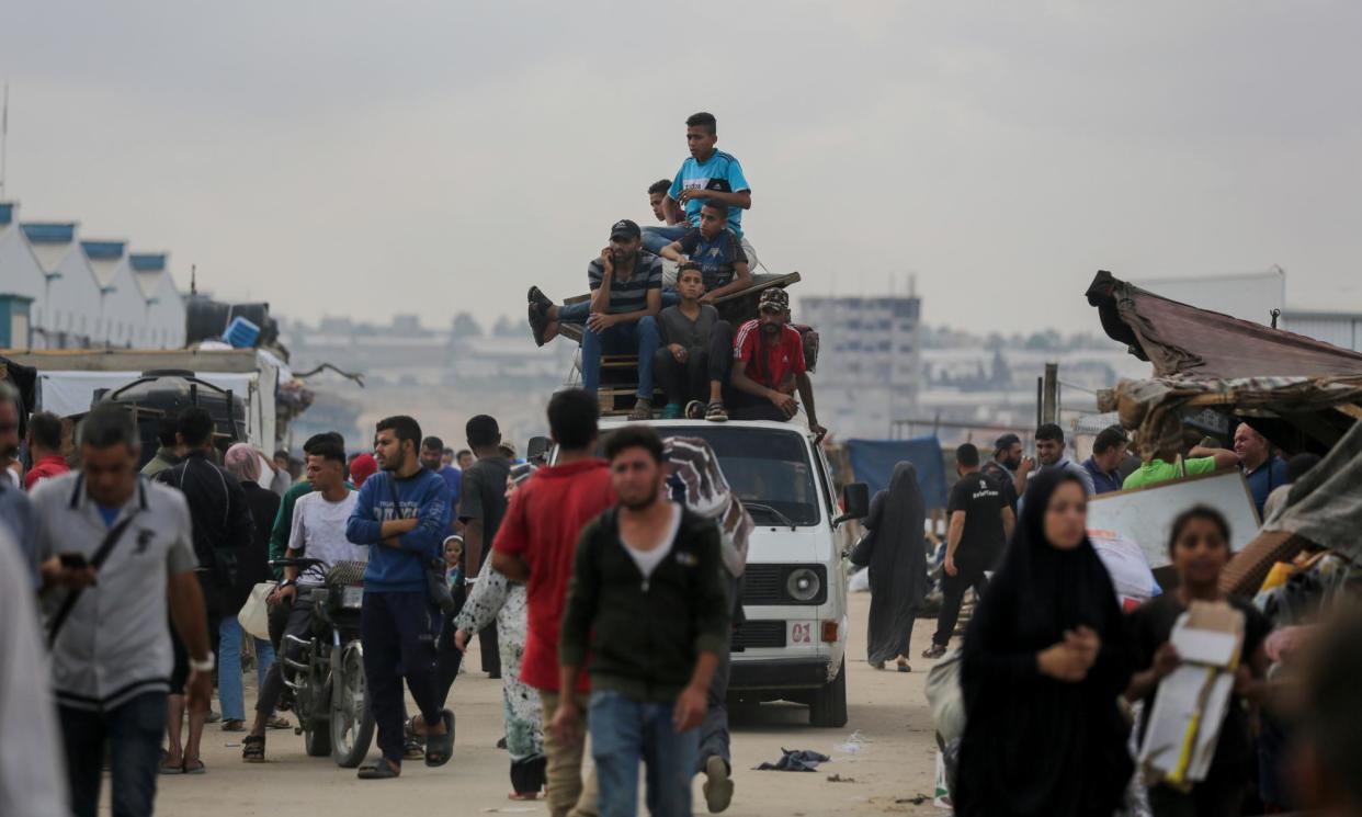 <span>Palestinians flee Rafah, where hundreds of thousands are still sheltering, as Unrwa says there is nowhere safe left to go and Israel targets the city with airstrikes.</span><span>Photograph: Jehad Alshrafi/AP</span>