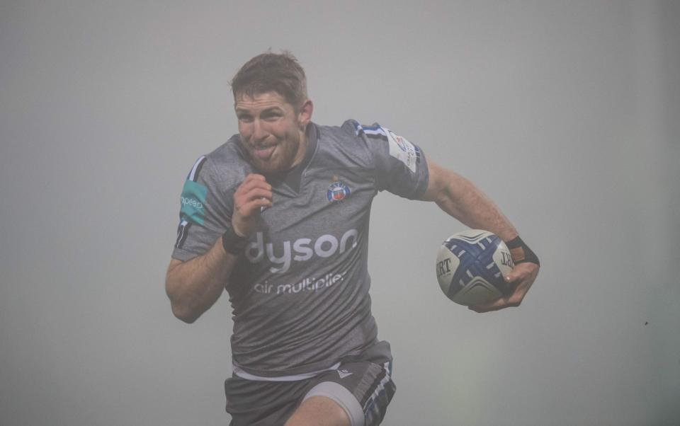 Bath's English full-back Ruaridh McConnochie runs with the ball and scores a try during the European Champions Cup Round 3 Pool A rugby union match between La Rochelle and Bath at Stade Marcel Deflandre in La Rochelle, western France on January 15, 2022. - GETTY IMAGES