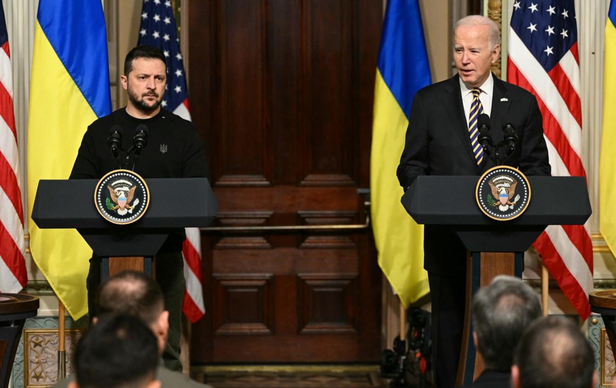 Ukraine's leader Volodymyr Zelensky meets with US President Joe Biden in Dec 2023, whom Vladimir Putin has named as a preferred presidential candidate