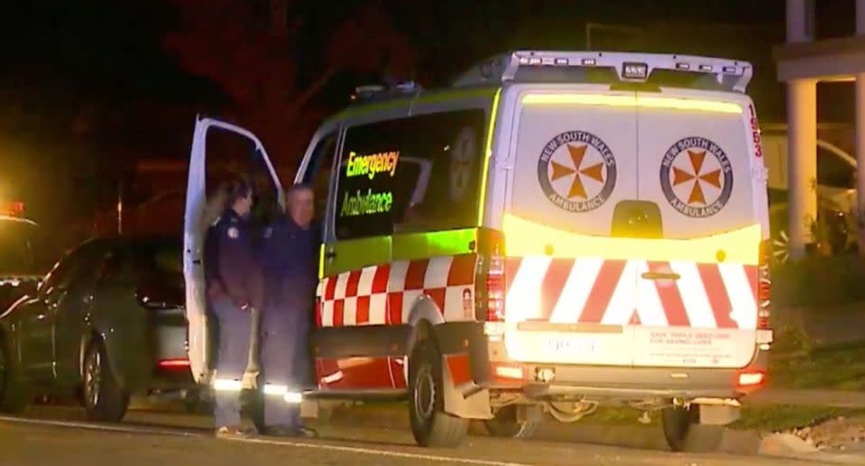 An ambulance attends the home of Jessica Camilleri, who is accused of decapitating her mother.