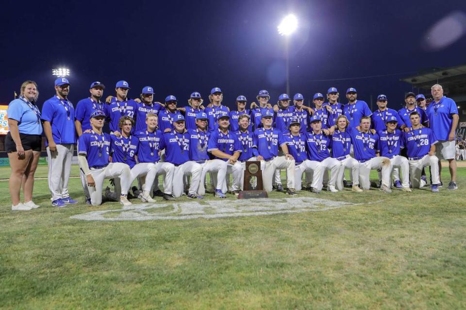 Columbia’s baseball team poses for a team picture after dropping the IHSA Class 2A state championship game to Joliet Catholic Academy at Dozer Park in Peoria. The Eagles finished their outstanding season at 34-5.
