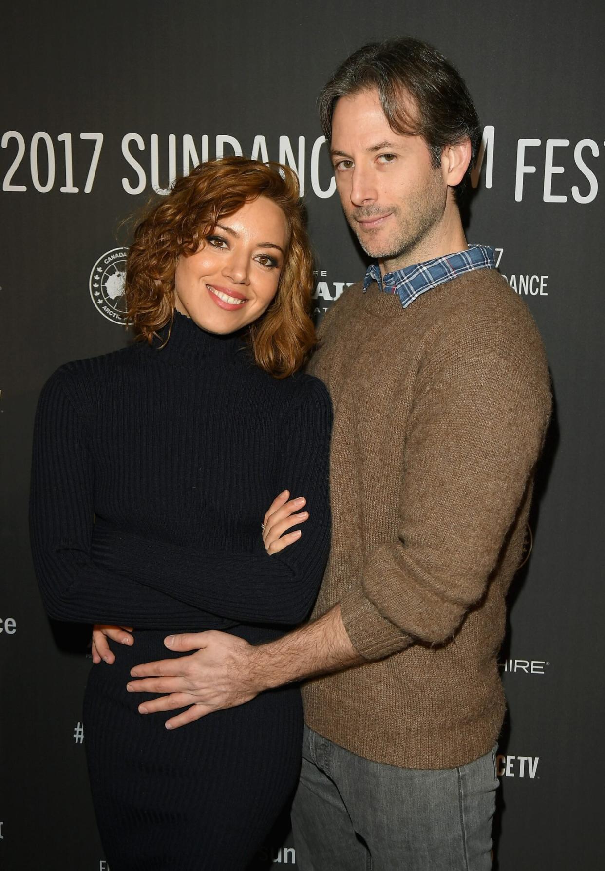 Aubrey plaza and Jeff Baena pose for photograph