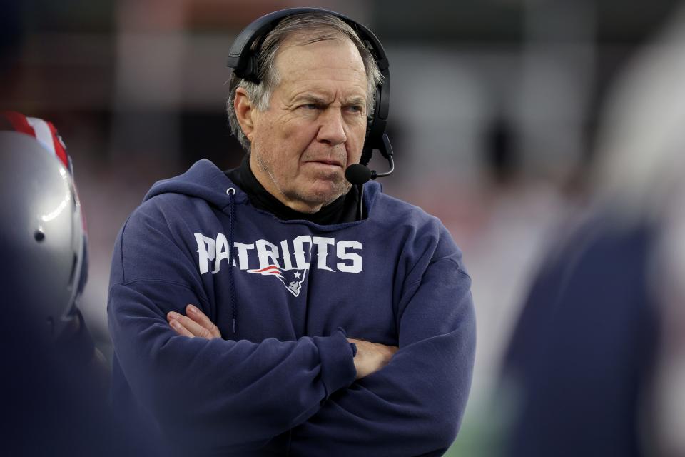 Head coach Bill Belichick of the New England Patriots looks on during the second half against the Kansas City Chiefs at Gillette Stadium on December 17, 2023 in Foxborough, Massachusetts.