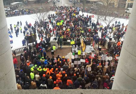 Workers rally outside the State Capitol building in Madison, Wisconsin February 25, 2015. REUTERS/Brendan O'Brien