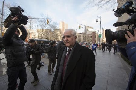 Daniel Bonventre, back-office director for Bernard L. Madoff Investment Securities LLC, exits the Manhattan Federal Court house in New York, March 24, 2014. REUTERS/Brendan McDermid