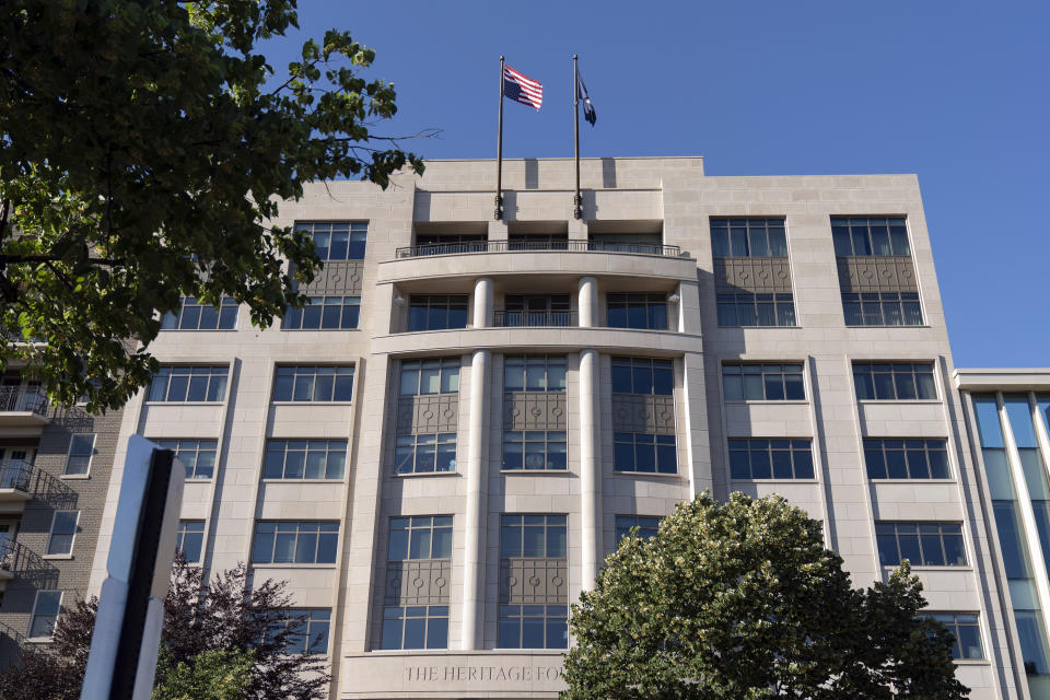 FILE - An American flag is seen upside down at the Heritage Foundation in Washington, May 31, 2024. The conservative think tank that is planning for a complete overhaul of the federal government in the event of a Republican presidential win is suggesting that President Joe Biden might try to hold the White House "by force" if he loses the November election. (AP Photo/Jose Luis Magana, File)