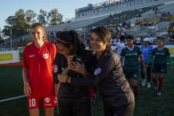 Daniela Silva, second from left, is hugged by Fernanda Torres, right, after Mexico played against Denmark at the Homeless World Cup, Tuesday, July 11, 2023, in Sacramento, Calif. The games are also much shorter than traditional soccer matches, lasting only seven minutes each half, so anyone can participate. Each country can bring a men’s and women’s team. Women can compete on the men’s team if the country is not bringing a women’s team. (AP Photo/Godofredo A. Vásquez)