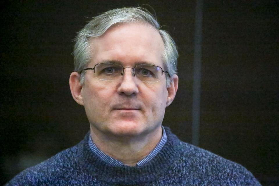 FILE - Paul Whelan, a former U.S. Marine accused of espionage, listens to the verdict in a courtroom in Moscow, Russia, June 15, 2020. Arrests of Americans in Russia have become increasingly common as relations between Moscow and Washington sink to Cold War lows. Some have been exchanged for Russians held in the U.S., while for others, the prospects of being released in a swap are less clear. (Sofia Sandurskaya, Moscow News Agency photo via AP, File)