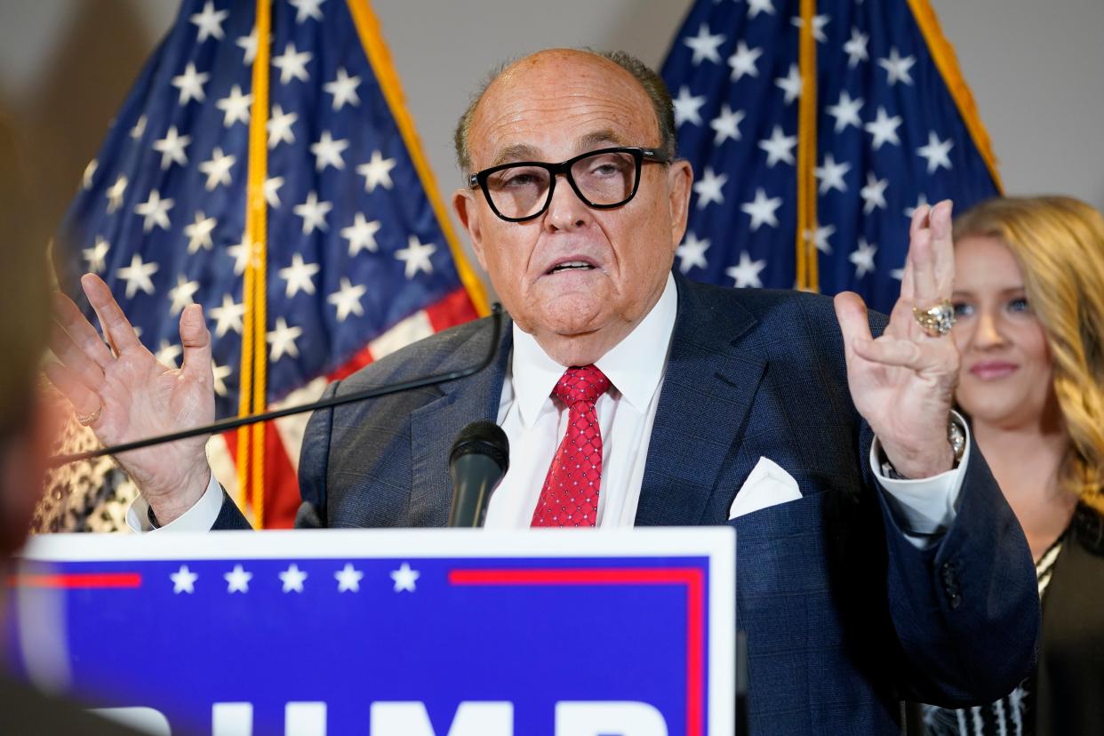  In this 19 November 2020 file photo former Mayor of New York Rudy Giuliani, a lawyer for President Donald Trump, speaks during a news conference at the Republican National Committee headquarters in Washington ((Associated Press))