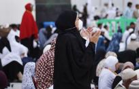 A Muslim pilgrim prays at the Grand mosque in the holy city of Mecca ahead of the annual haj pilgrimage October 12, 2013. REUTERS/Ibraheem Abu Mustafa (SAUDI ARABIA - Tags: RELIGION)