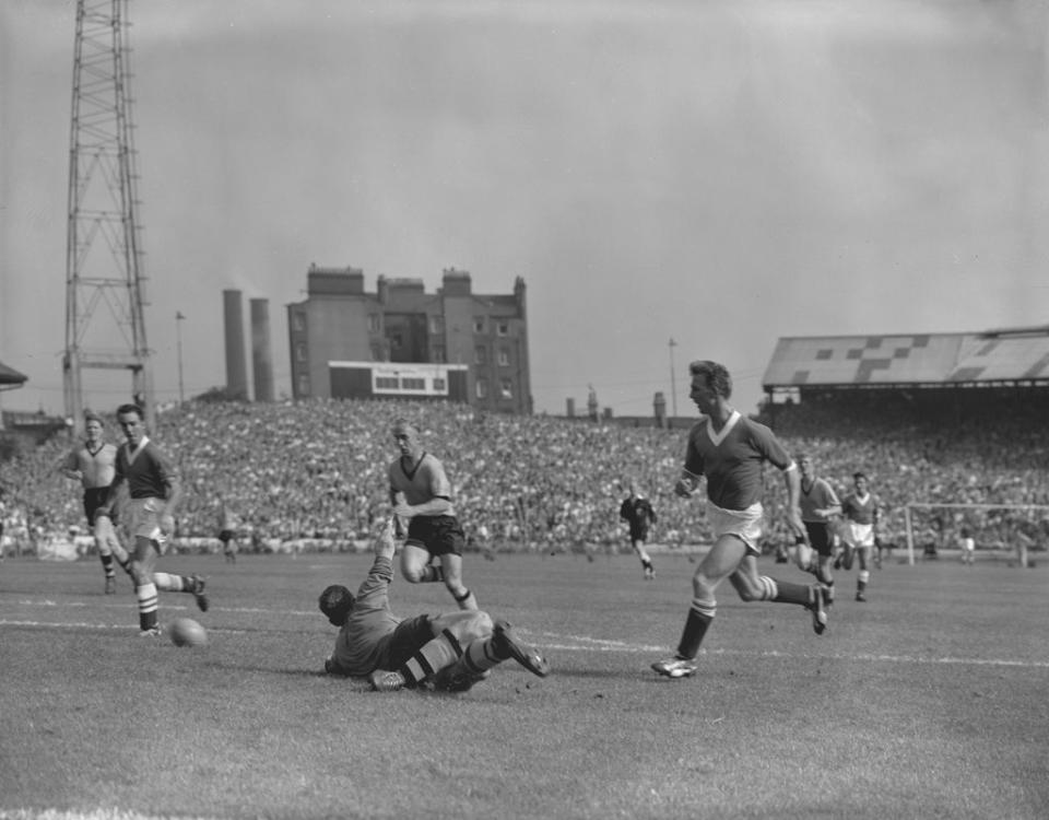 Jimmy Greaves, left, on target for Chelsea against Wolves in 1958 (PA) (PA Archive)