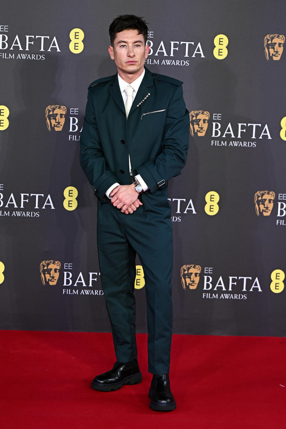 green burberry suit, red carpet style, LONDON, ENGLAND - FEBRUARY 18: Barry Keoghan attends the 2024 EE BAFTA Film Awards at The Royal Festival Hall on February 18, 2024 in London, England. (Photo by Stephane Cardinale - Corbis/Corbis via Getty Images)