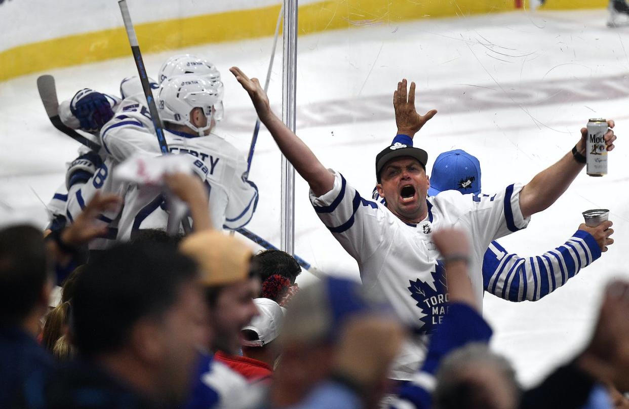 Toronto Maple Leafs fans and players celebrate a goal during the second round playoff series against the Florida Panthers. (Michael Laughlin/AP Photo)