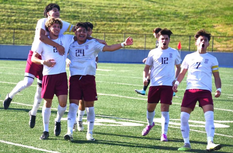 The Golden Valley High boys soccer players celebrate after No. 24 Jose Ontiveros scored the first goal of the Cougars’ 4-2 win over Del Oro in the Sac-Joaquin Section Division II championship match at Cosumnes River College in Sacramento, Calif. on Saturday, Feb. 24, 2024.